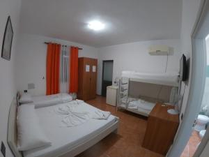 Postel nebo postele na pokoji v ubytování Hotel Bolonja