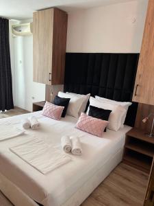 Postel nebo postele na pokoji v ubytování Dreams Family Hotel