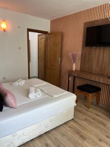 Postel nebo postele na pokoji v ubytování Dreams Family Hotel