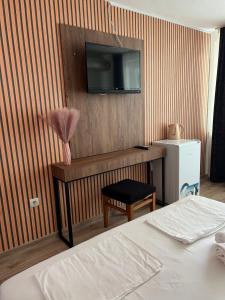Postel nebo postele na pokoji v ubytování Dreams Family Hotel