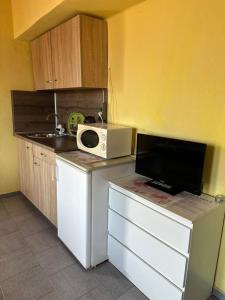 A kitchen or kitchenette at La Kameya