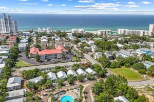 an aerial view of a resort with the ocean at Seagrove, 2 Bd , Sleeps 8, Stillwater 30A, Walk to Beach ,Pool in Santa Rosa Beach