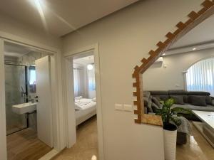 Postel nebo postele na pokoji v ubytování Dion apartamen