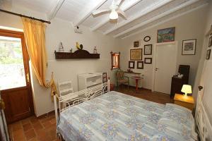 Ένα ή περισσότερα κρεβάτια σε δωμάτιο στο Il Casale Residence +52 φωτογραφίες