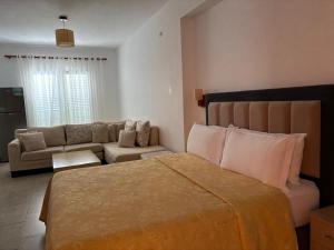 Posezení v ubytování Grand Resort by Greccia Dhermi Prime