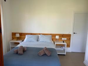 Postel nebo postele na pokoji v ubytování La Coma Sa Riera