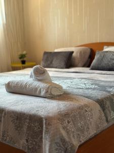 A bed or beds in a room at La Kameya