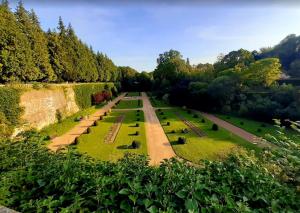 an aerial view of a garden with grass and trees at Le reflet de la cathédrale in Saint-Omer