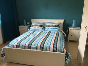 מיטה או מיטות בחדר ב-Hostal Tres Cantos