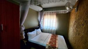 Ліжко або ліжка в номері Chello Suites