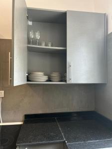 Kuchyň nebo kuchyňský kout v ubytování Saims Home