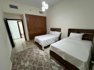Postel nebo postele na pokoji v ubytování Beach View apartments