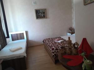 Postel nebo postele na pokoji v ubytování Akhaltsikhe hotel “Sunny House”