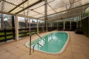 Swimmingpoolen hos eller tæt på Complejo La Austriaca, piscina climatizada y parrilla!