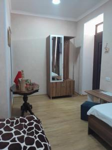 Postel nebo postele na pokoji v ubytování Akhaltsikhe hotel “Sunny House”