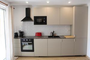 Kuchyň nebo kuchyňský kout v ubytování Charmant appartement proche mer