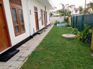 Zahrada ubytování Tropical Suites - Airport Transit Residence