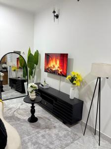 Гостиная зона в Luna One bedroom Apartment Mbezi beach -makonde +32 фотографии