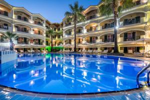 a large swimming pool in front of a hotel at Zante Atlantis Hotel in Laganas