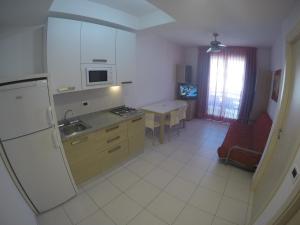 Kuchyň nebo kuchyňský kout v ubytování Residence Zenith