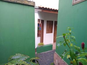 Fotografie z fotogalerie ubytování Quarto para 4 com banheiro privado a 900 metros da Vila do Capão v destinaci Vale do Capao