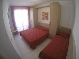 Postel nebo postele na pokoji v ubytování Residence Zenith