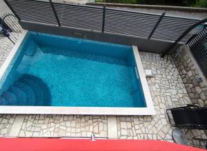 Bazén v ubytování Holiday Home Kresić nebo v jeho okolí