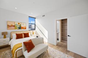 En eller flere senge i et værelse på Trendy Chic