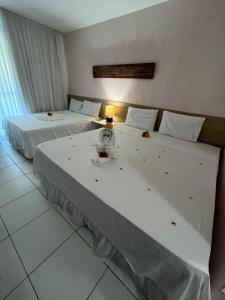 Postel nebo postele na pokoji v ubytování Iloa Flat Residence studio 104V