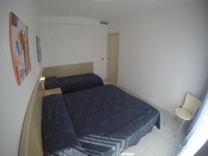 Postel nebo postele na pokoji v ubytování Residence Zenith
