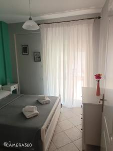 Postel nebo postele na pokoji v ubytování Apartment R&F1