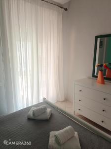Postel nebo postele na pokoji v ubytování Apartment R&F1