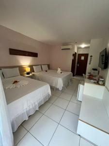 Postel nebo postele na pokoji v ubytování Iloa Flat Residence studio 104V