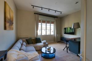 Χώρος καθιστικού στο Amazing terrace apartment in the historical centre - Teate Suite