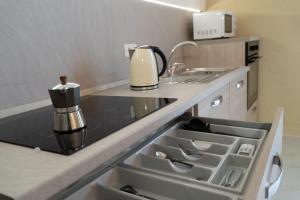 Η κουζίνα ή μικρή κουζίνα στο Casa Gennaro a Laterza - Solo 10 min da Matera +23 φωτογραφίες