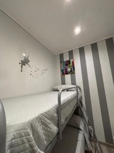 Ένα ή περισσότερα κρεβάτια σε δωμάτιο στο Solemar Milicia