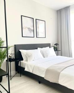 En eller flere senge i et værelse på Marea Garden Apartment Ravda