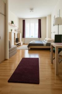 Posteľ alebo postele v izbe v ubytovaní Andy's Home Central Apatment