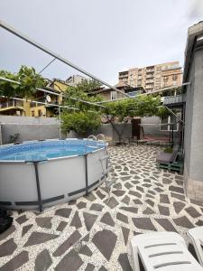a bath tub sitting on top of a building at Villa in Old Tbilisi in Tbilisi City