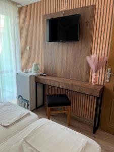 Postel nebo postele na pokoji v ubytování Dreams Family Hotel