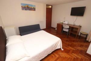 Condo located just 4 blocks from the main square客房内的一张或多张床位
