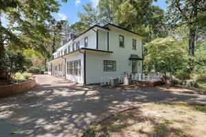 a large white house with a driveway at WestWind Estate in Spartanburg