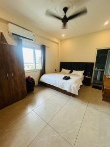 Giường trong phòng chung tại La Casa Bonita - Boutique HomeStay Wellness Retreat