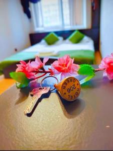 En eller flere senge i et værelse på Гостиница Зеленая