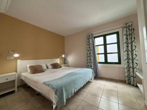 Postel nebo postele na pokoji v ubytování Relax Mogán vivienda vacacional