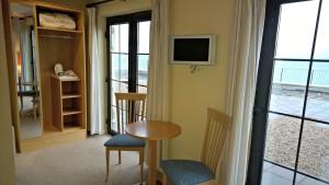 TV a/nebo společenská místnost v ubytování Pier Head Hotel Spa & Leisure