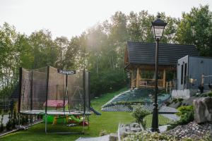 Chaty pod Pilskiem - sauna i jacuzzi w cenie外面的花园
