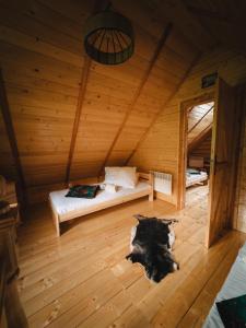 Chaty pod Pilskiem - sauna i jacuzzi w cenie客房内的一张或多张床位