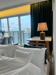 Postel nebo postele na pokoji v ubytování Reda City Apartament Bronowicka + 10 fotografií