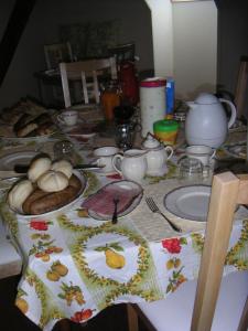 Restoranas ar kita vieta pavalgyti apgyvendinimo įstaigoje Bed & Breakfast Onder Dak